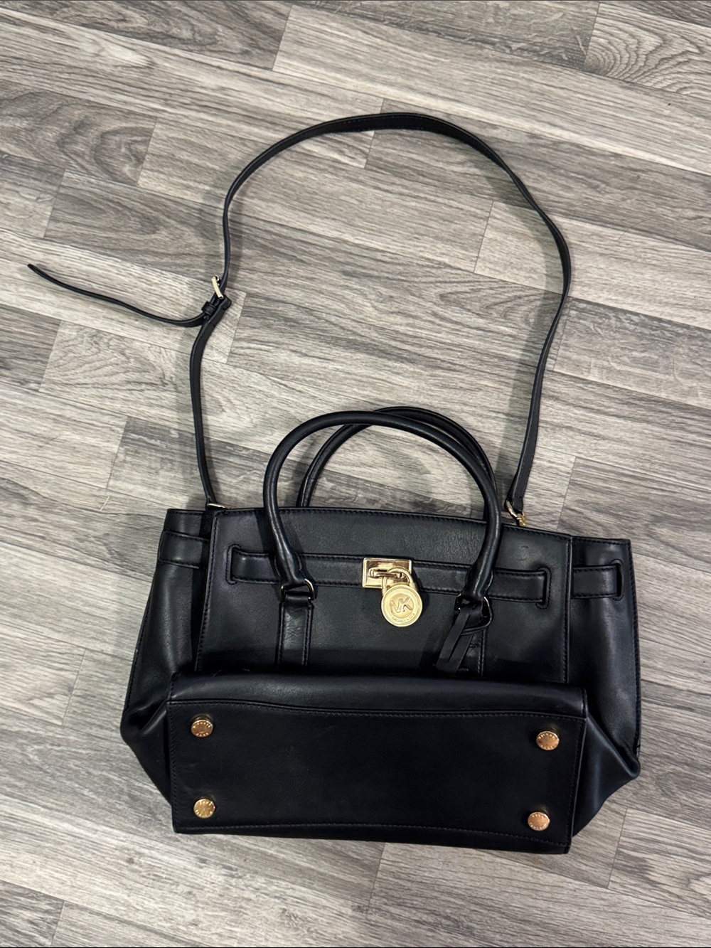 MICHAEL Michael Kors black leather purse with gold hardware accents